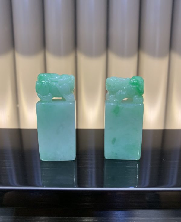 A pair of Icy faint apple green PIXIU Jadeite seal