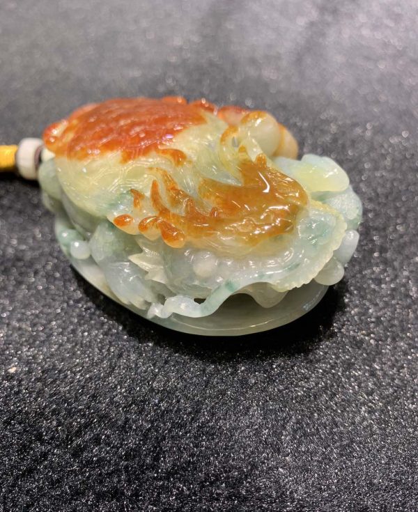 Translucent reddish dragon head turtle jadeite ornament