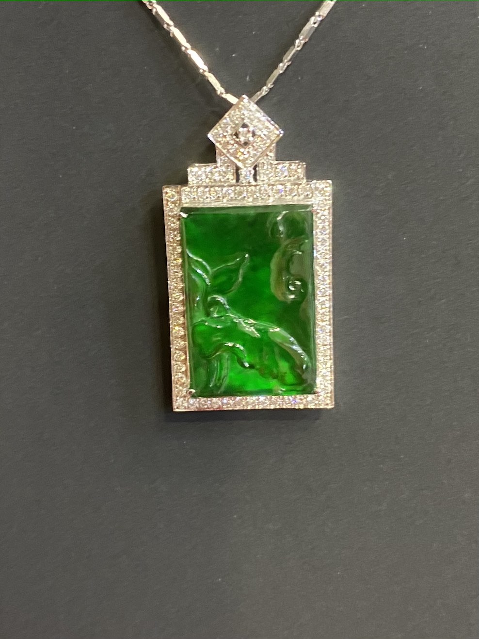 highly translucent icy vibrant green lotus jadeite pendant