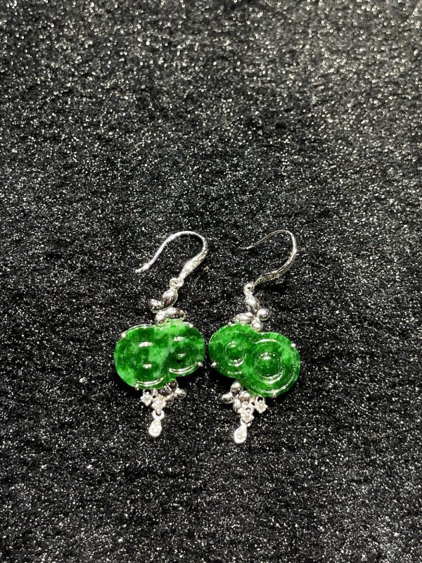 Translucent old pit green jadeite dangling earring
