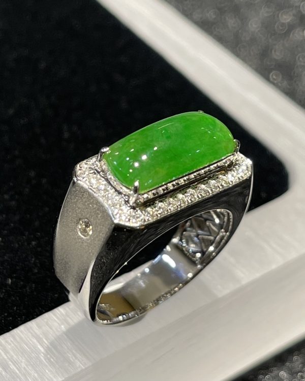 Icy translucent vibrant green saddle jadeite ring