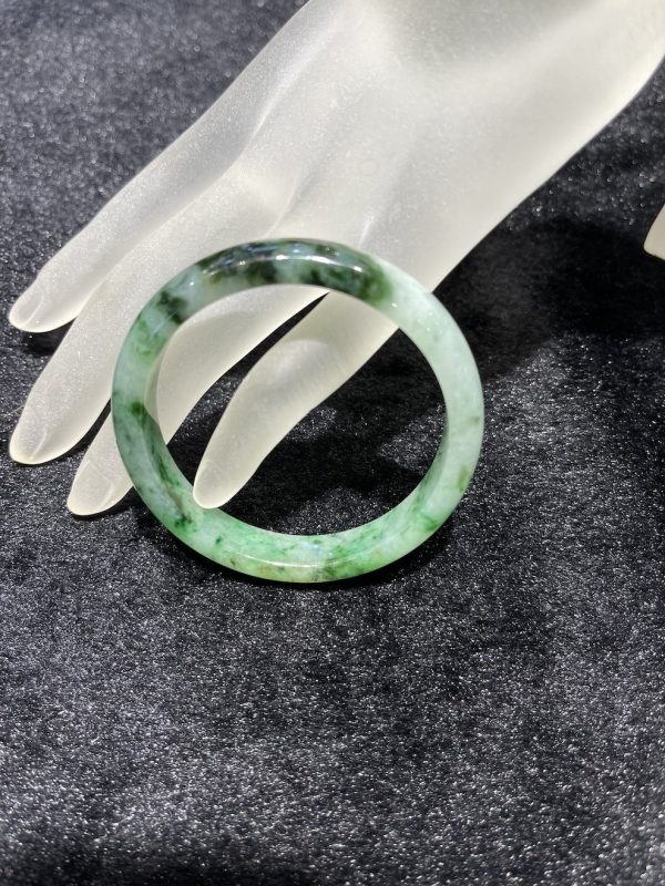 Translucent faint old pit green jadeite bangle