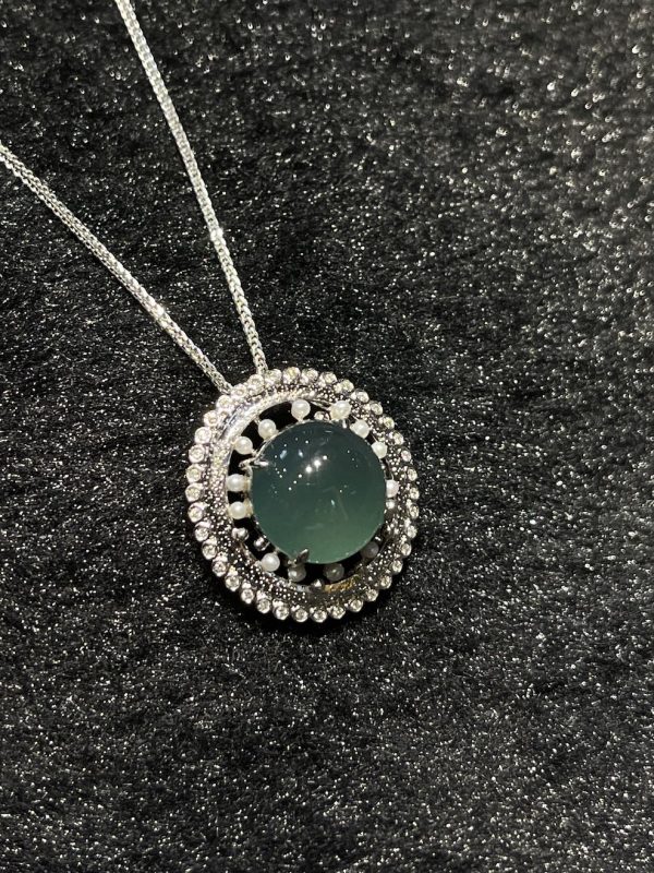 Icy translucent blue cabochon jadeite pendant - Image 2