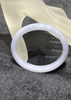 Translucent faint lavender oval shape jadeite bangle
