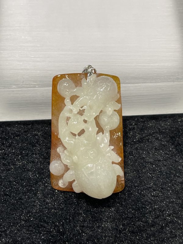 Icy translucent whiteish brown beetles jadeite pendant