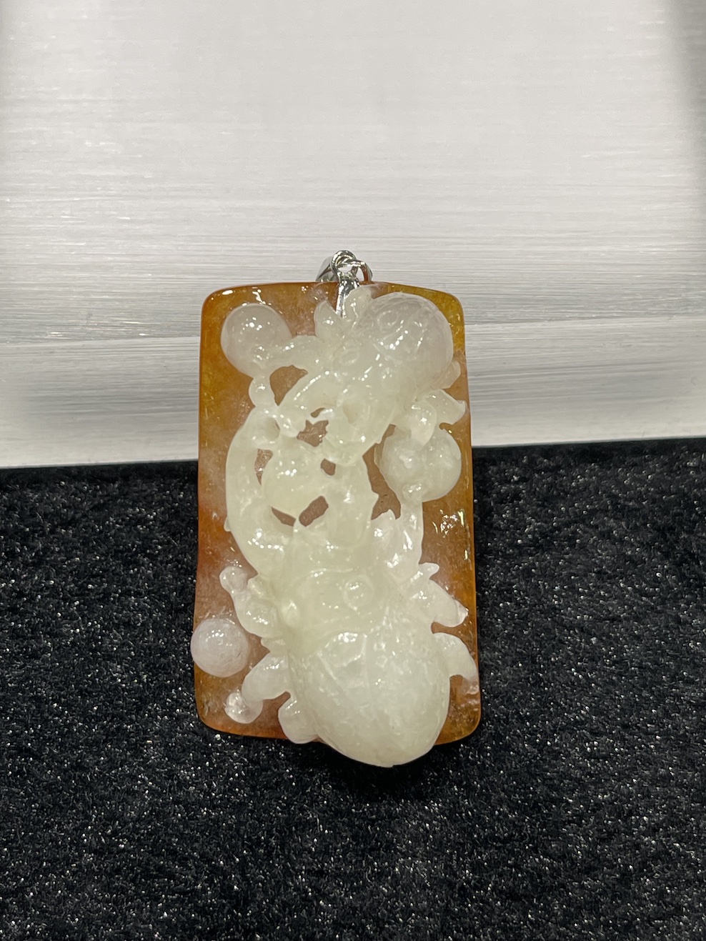 Icy translucent whiteish brown beetles jadeite pendant