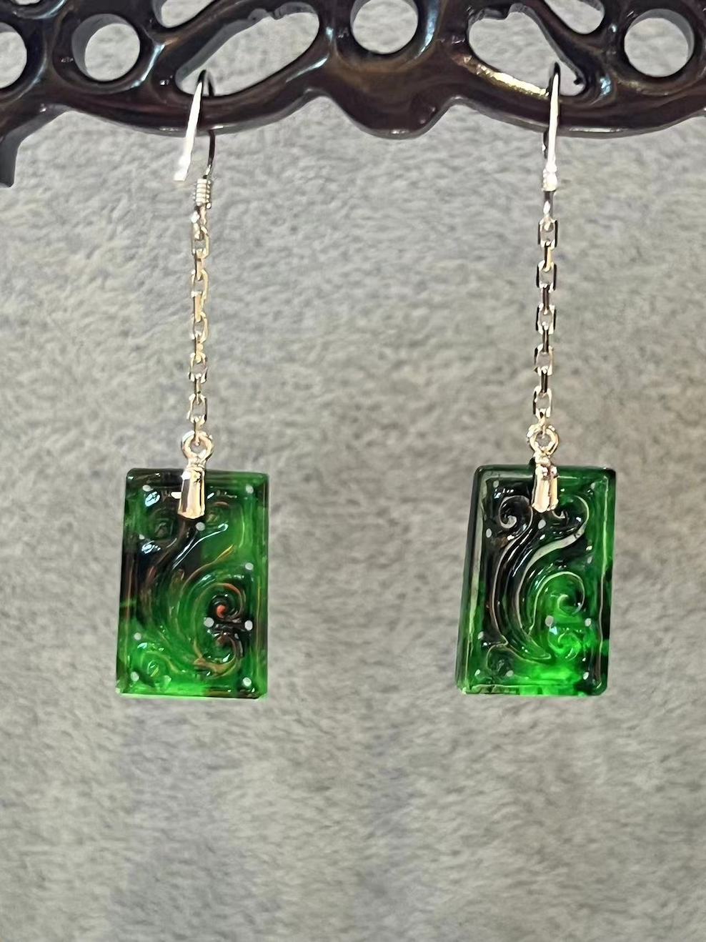 icy translucent vibrant old pit green jadeite earring