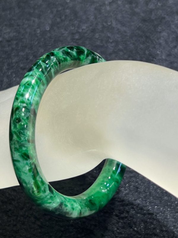 Dark old pit Green Jadeite bangle