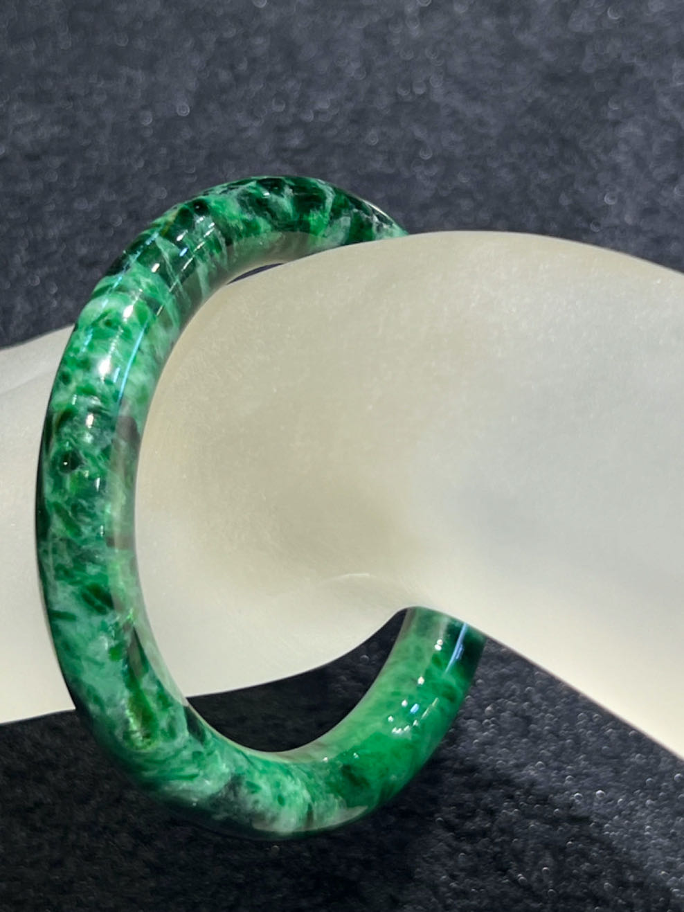 Dark old pit Green Jadeite bangle