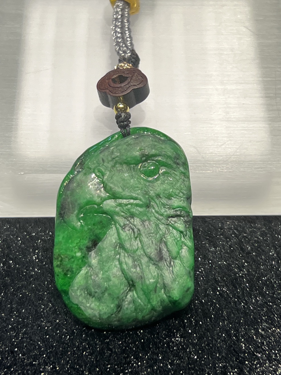 translucent vibrant green eagle jadeite pendant