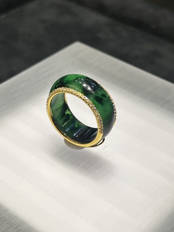 Translucent old pit green jadeite ring with 18K gold and diamond casing – Nanyang Jade Singapore
