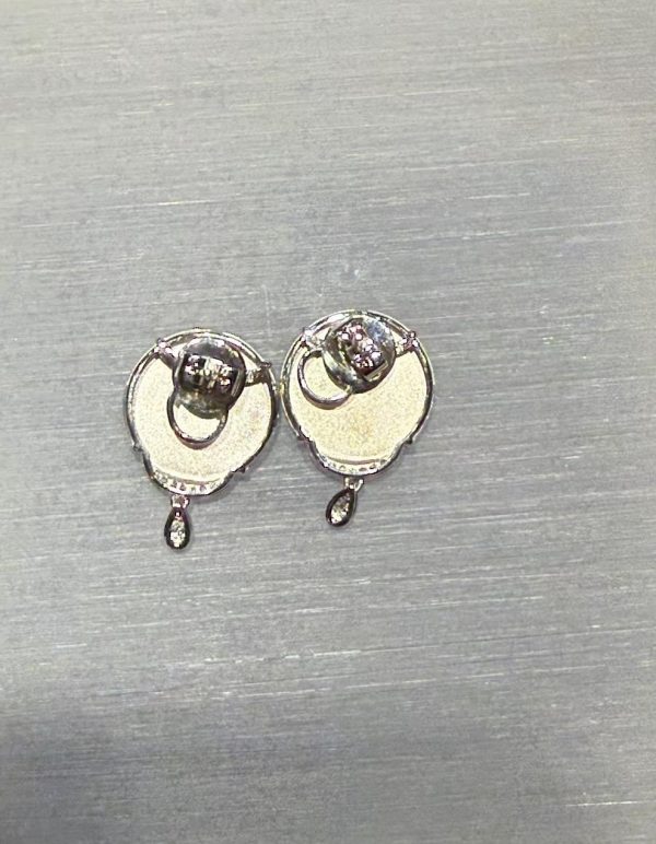 Translucent old pit green jadeite safety disc earrings with 18K white gold and diamonds