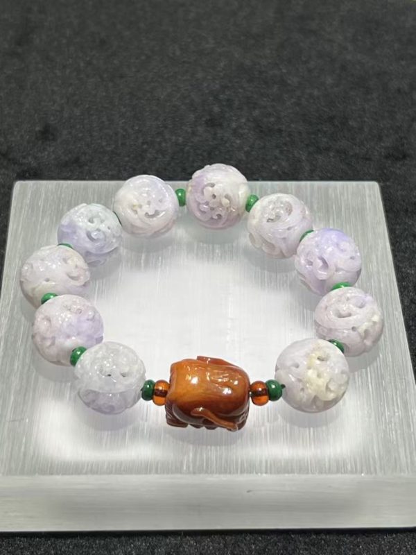 translucent Lavender Carving beads with Reddish Dragon Head Accent jadeite bracelet - Image 3