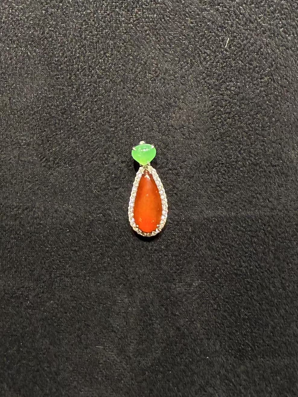 Translucent reddish teardrop shape jadeite pendant - Image 5