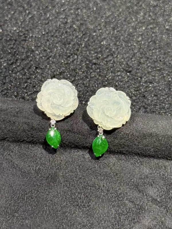 Translucent flower carving jade earrings with fancy-shaped green jade dangling in 18K white gold