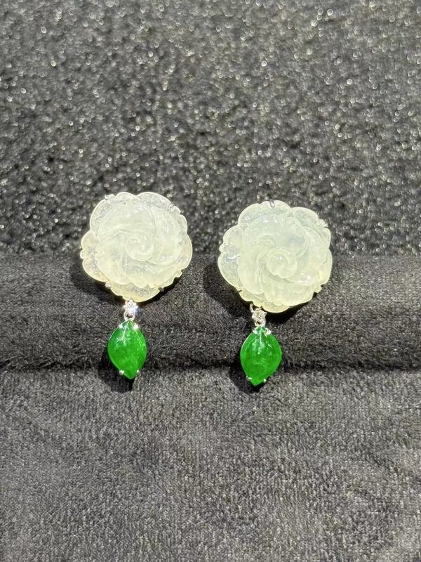Translucent flower carving jade earrings with fancy-shaped green jade dangling in 18K white gold