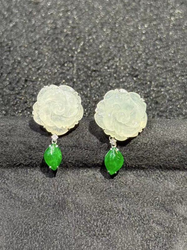 Translucent flower carving jade earrings with fancy-shaped green jade dangling in 18K white gold