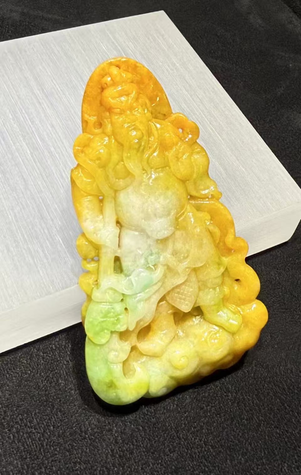 Translucent vibrant yellow with faint green Guan Gong jadeite pendant
