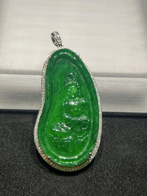 Icy translucent vibrant green Guanyin jadeite pendant with diamond setting in 18K white gold