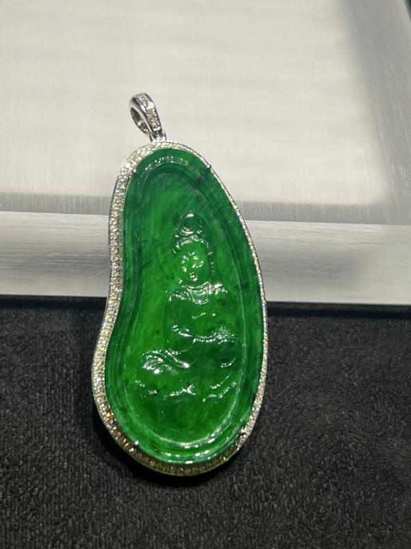 Icy translucent vibrant green Guanyin jadeite pendant with diamond setting in 18K white gold