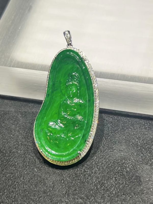 Icy translucent vibrant green Guanyin jadeite pendant with diamond setting in 18K white gold