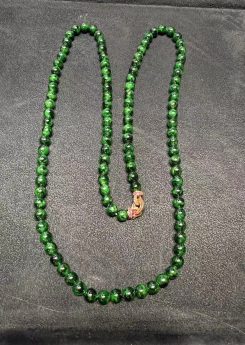 Translucent old pit green jadeite beads necklace with brass clasp, featuring vivid green colour and smooth polished surface