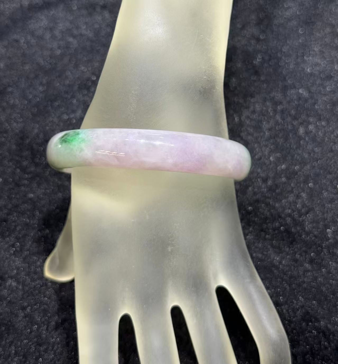 Translucent lavender jadeite bangle with soft green patches