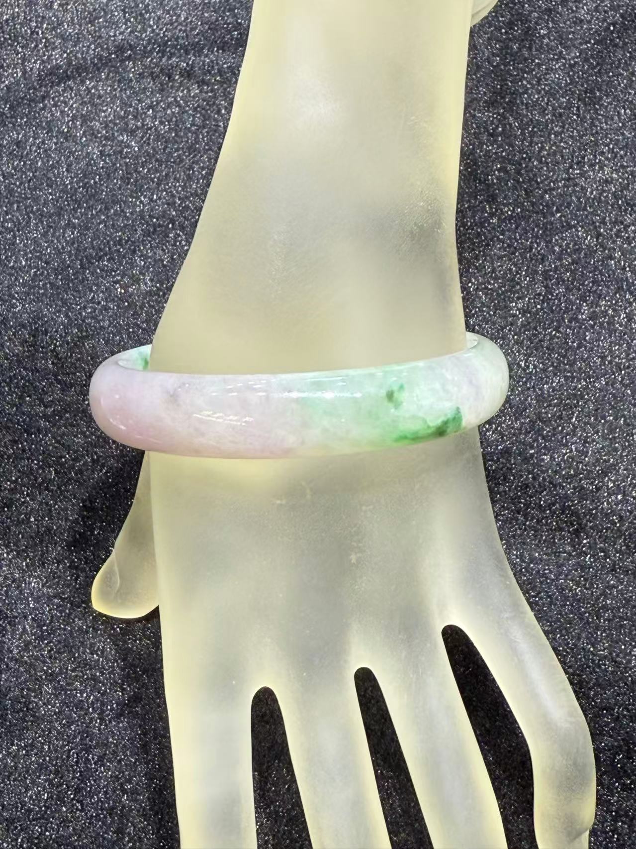 Translucent lavender jadeite bangle with soft green patches