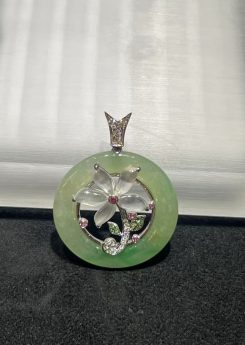 Translucent floral jadeite pendant with icy jade flower and green circular jade set in 18K white gold