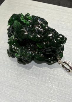 translucent dark green Pixiu jadeite pendant with detailed carving