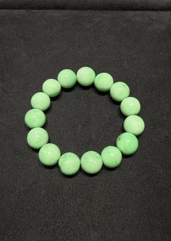 translucent apple green jadeite bead bracelet with smooth round beads
