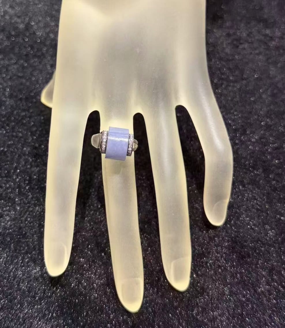 Translucent bluish lavender jadeite wealth ring with 18K gold rhodium setting and diamond accents
