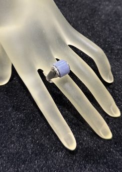 Translucent bluish lavender jadeite wealth ring with 18K gold rhodium setting and diamond accents