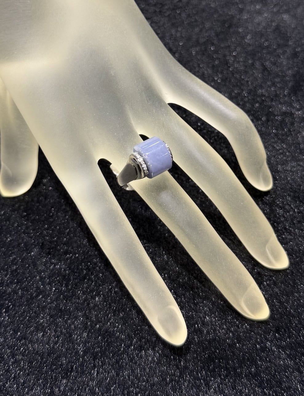 Translucent bluish lavender jadeite wealth ring with 18K gold rhodium setting and diamond accents