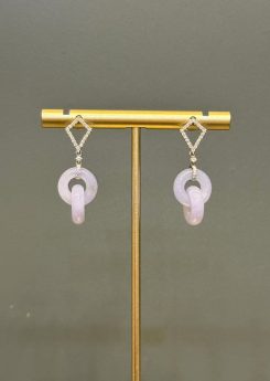 Lavender jade earrings with translucent pale lavender jadeite interlocking loops, hung from diamond-set 18k white gold kite-shaped studs