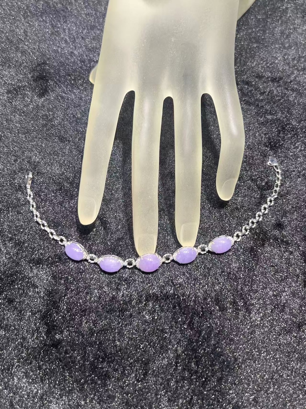 Lavender jade cabochon bracelet with five translucent lavender jadeite oval cabochons set in 18k white gold with diamond-set connecting links